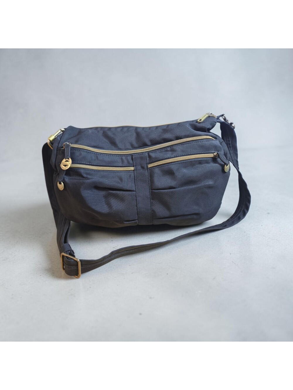 Travelon Y2K Slouch Crossbody Bag.